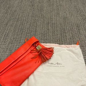 Perfect India Hicks orange clutch w/bag! Great bag that stands out!